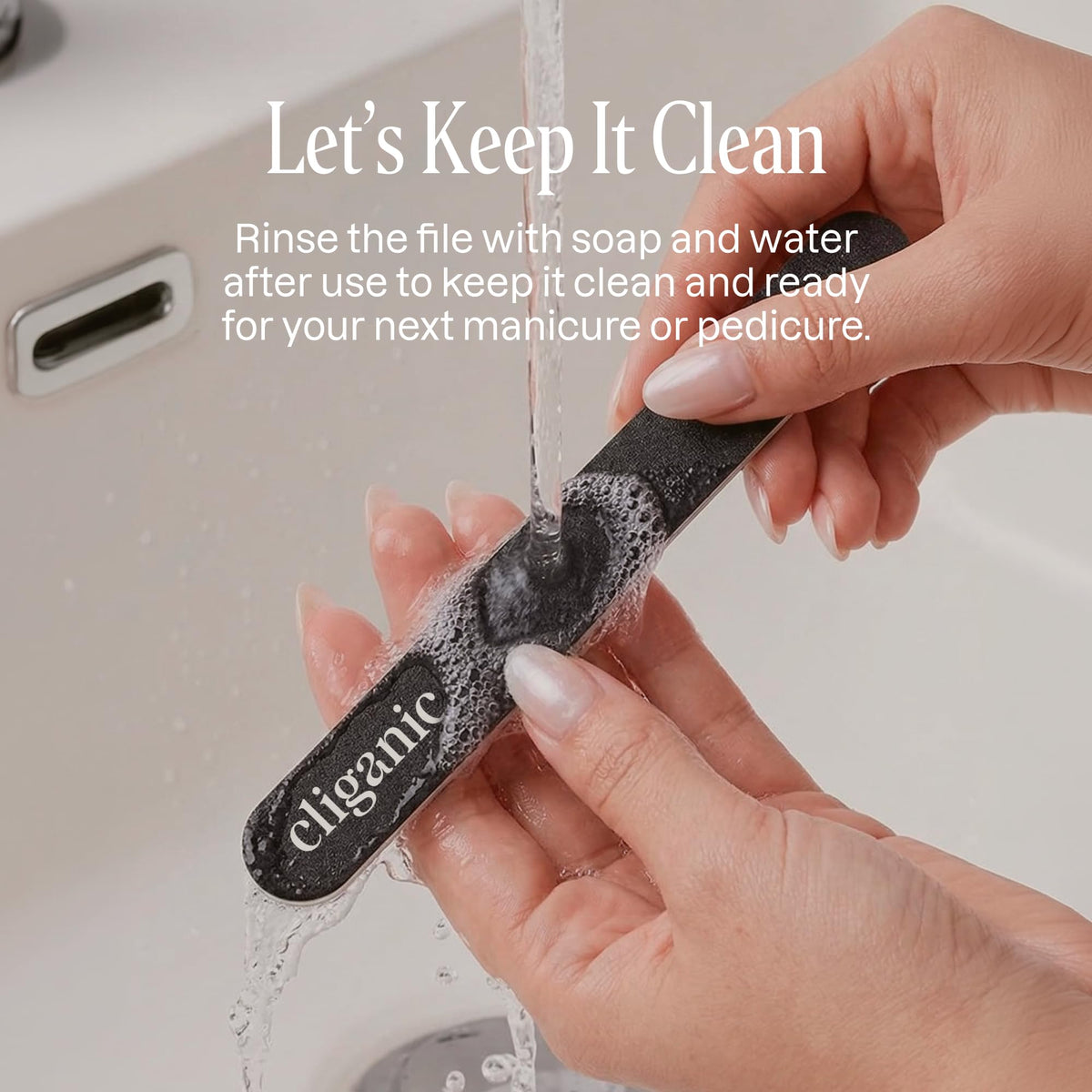 Cliganic rinsing under water to show washable design for easy cleaning