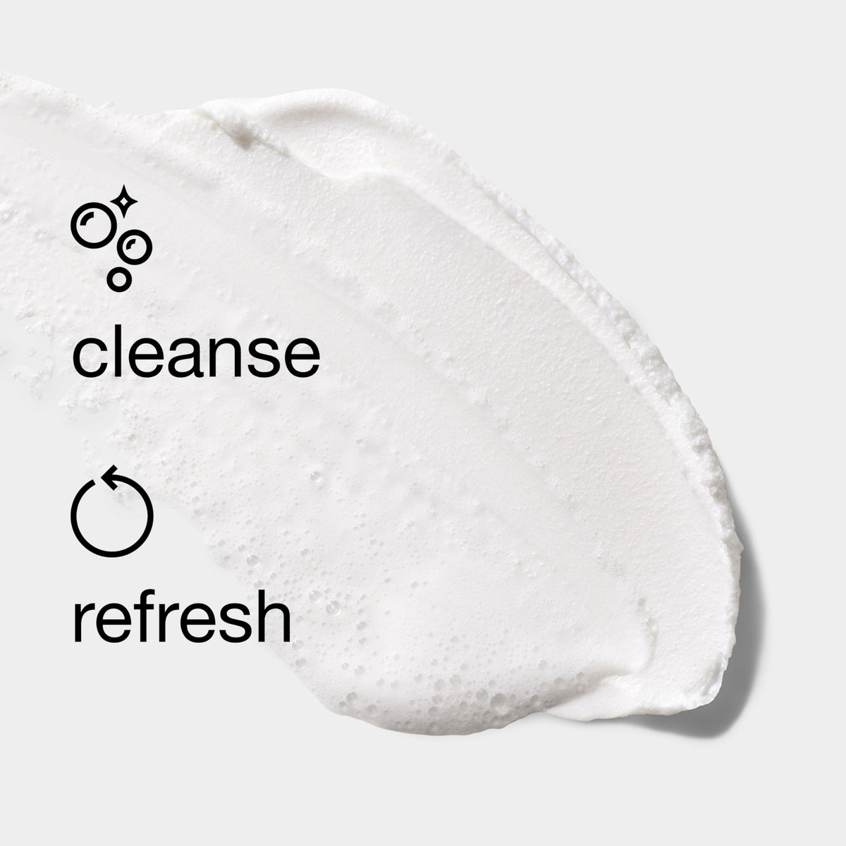 Clinique 5 fl oz bottle beside a hand for size reference and portability benefit