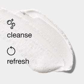 Clinique 5 fl oz bottle beside a hand for size reference and portability benefit