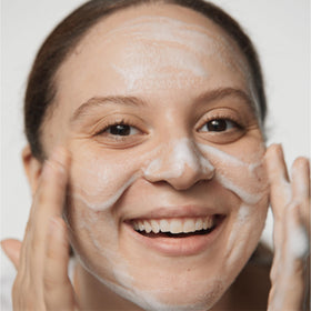 Clinique Acne Solutions mini in hand demonstrating compact travel convenience benefit