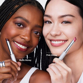 Clinique lip application of Pink Honey on model illustrating natural pink sheen and comfort