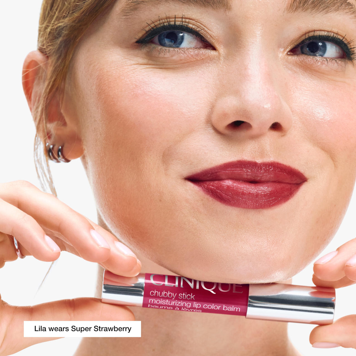 Clinique Chubby Stick Super Strawberry swatch on arm showing buildable pink tint and sheen