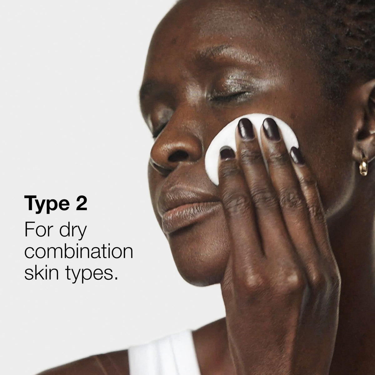 Clinique Clarifying Lotion 2 pouring next to measuring scale for accurate sizing benefit