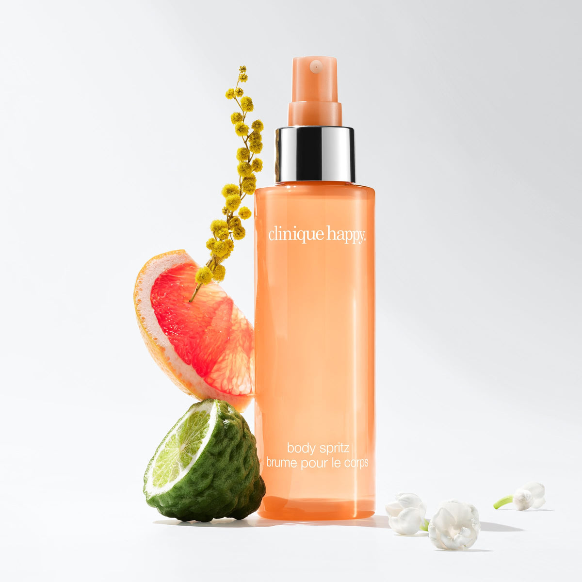 Clinique Happy nozzle close-up showing fine mist for quick refresh