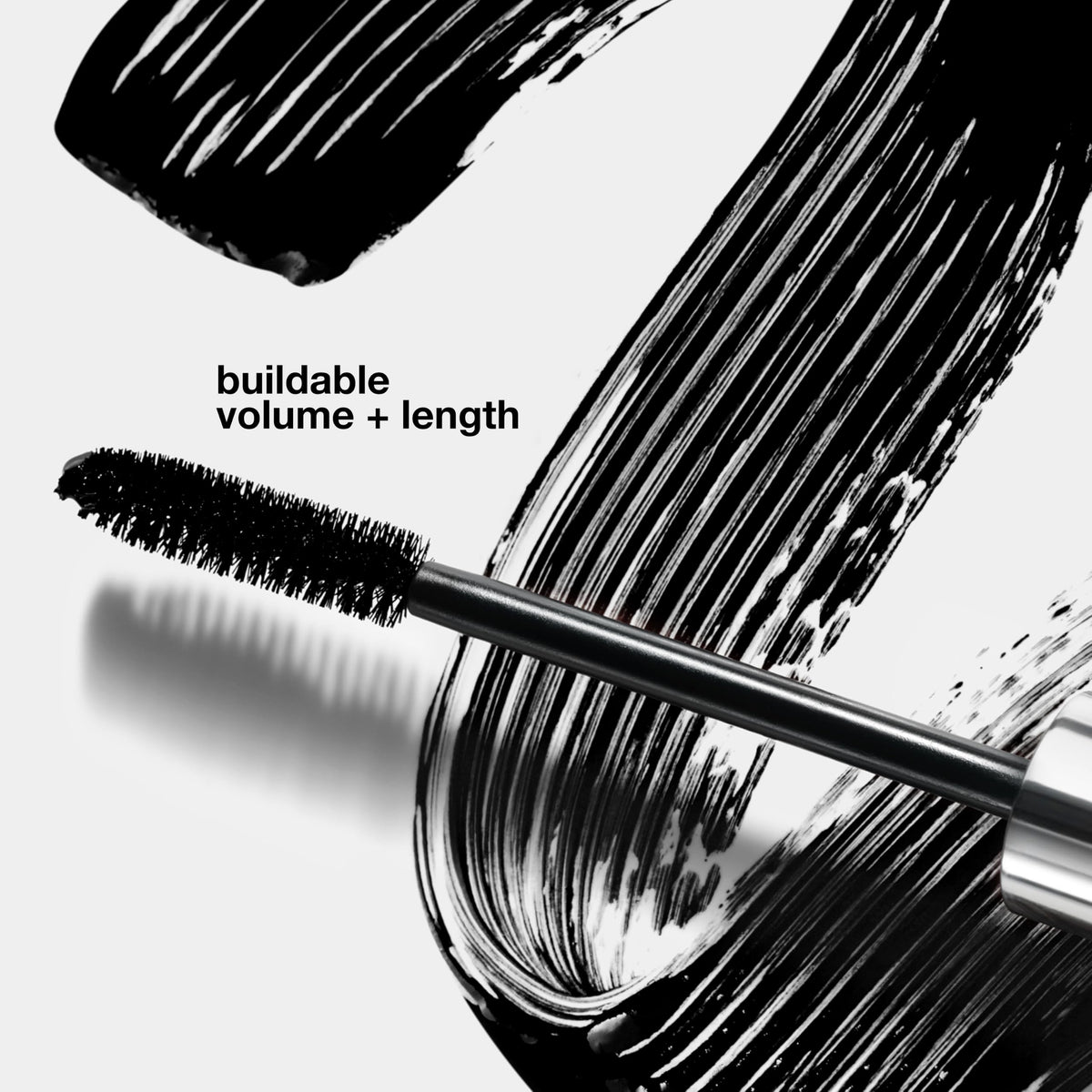 Clinique high impact mascara open tube detail highlighting soft-fiber wand for even application