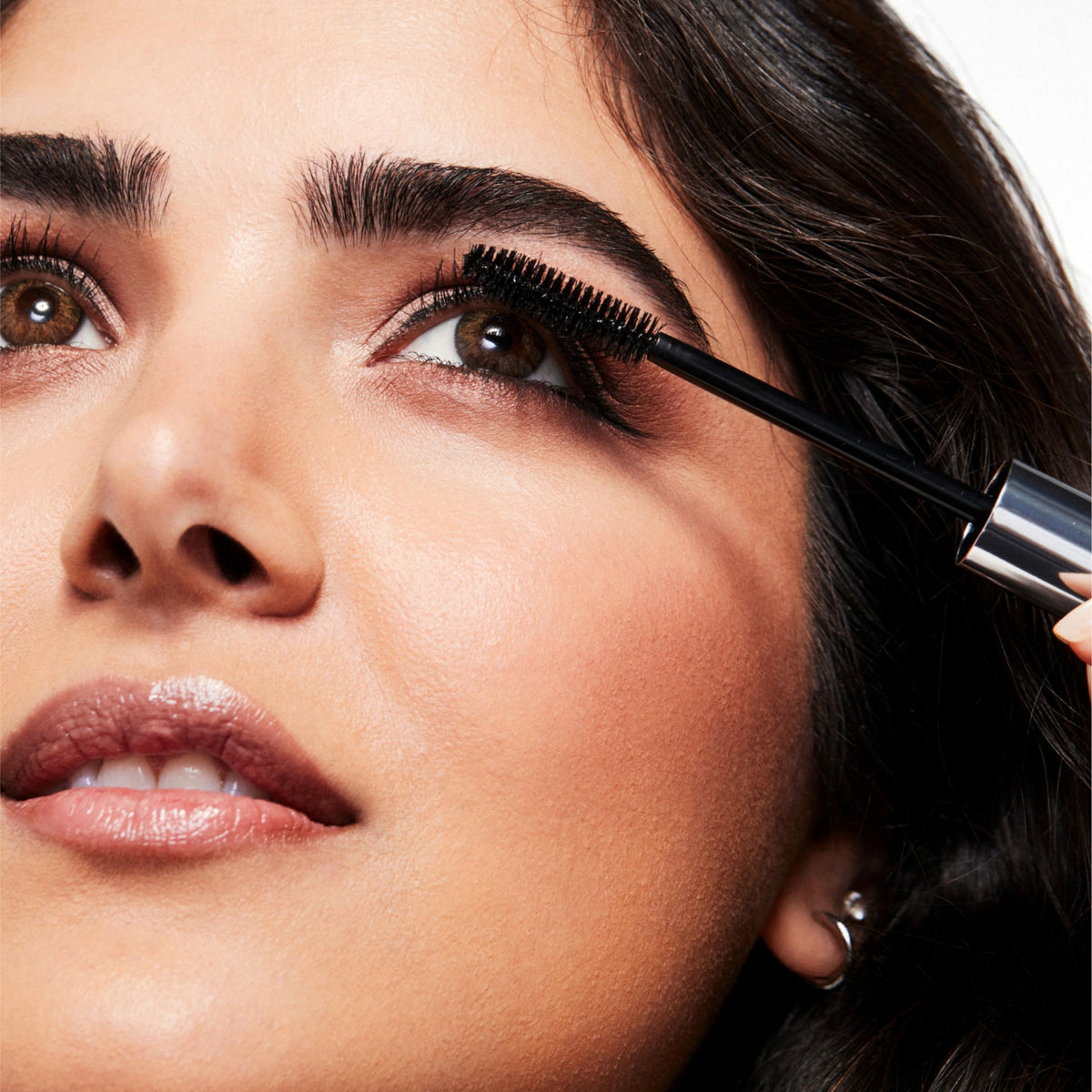 Clinique lash doubling mascara before and after lashes showing fuller, longer effect