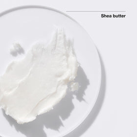 Clinique Moisture Surge Lip open jar top view showing dewy balm ready for use