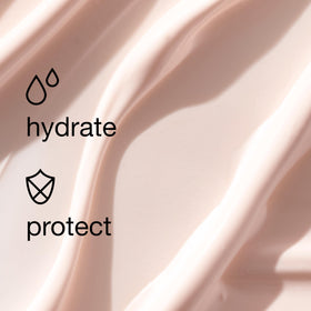 Clinique Moisture Surge swatch on hand showing sheer finish and non-greasy look