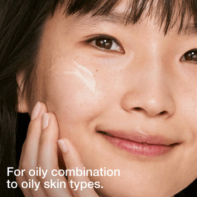 Clinique moisturizer on hand demonstrating fast absorption and matte result