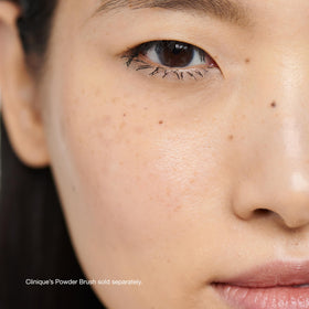 Clinique setting powder open jar top view showing translucent formulation and easy access