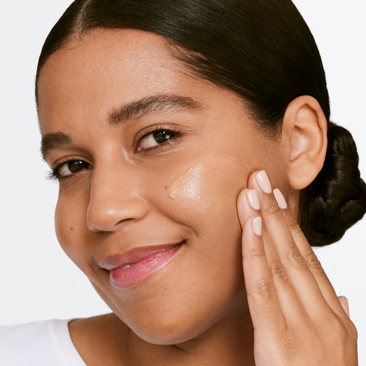 Clinique Sheertint packaging label displaying key ingredients and SPF benefit