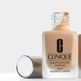 Clinique model applying foundation illustrating balanced hydration and oil control benefit