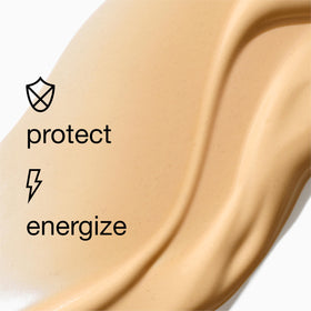 Clinique Superdefense bottle next to a ruler showing compact 1.4 fl oz size