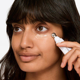 clinique cream texture on fingertip illustrating smooth hydrating consistency
