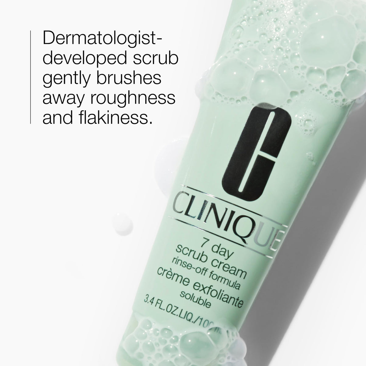 Clinique creamy scrub texture close-up showing fine silica particles for gentle polishing