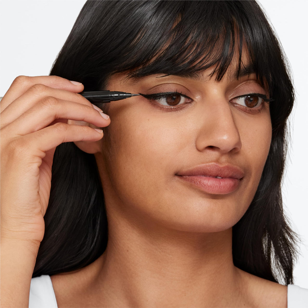 Clinique winged eye lifestyle look demonstrating crisp eyeliner and definition
