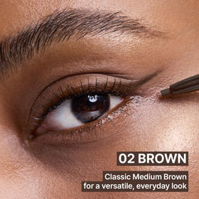 CLIO PROFESSIONAL brown liner texture swatch on skin showing smooth, tug-free glide