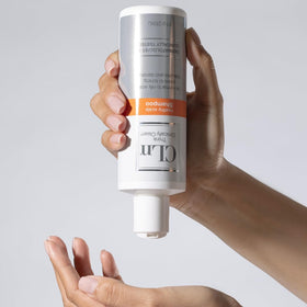 CLn bottle next to a ruler for scale, brand shows true 8 fl. oz. size
