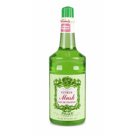 Clubman Pinaud bottle front view showing classic label and tidy finish benefit
