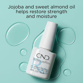 CND RescueRXx being applied to a nail and cuticle providing strengthening and moisture