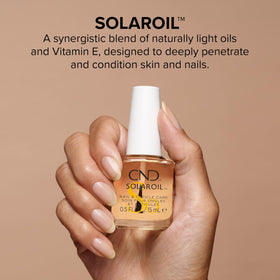 CND SolarOil dropper close-up highlighting oil texture and quick absorption benefit