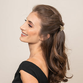 Cobahom clip holding a hair section while styling, useful for precise work