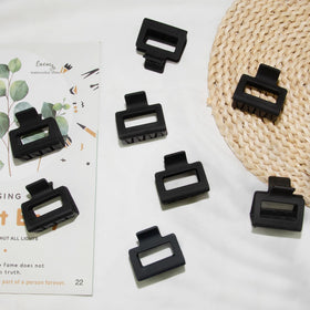 cobinaan lifestyle flatlay with clips and accessories showing versatile styling and gifting appeal