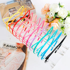 COCIDE headband beside a ruler showing 4.5 by 5.5 inch size for fit
