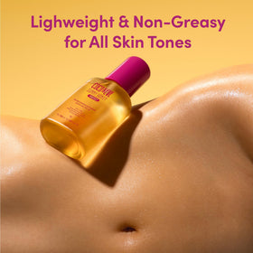 Coco & Eve oil being smoothed on arm for even, intensified tanning