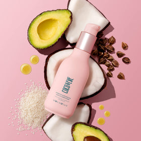 Coco & Eve bottle beside other haircare products showing routine pairing