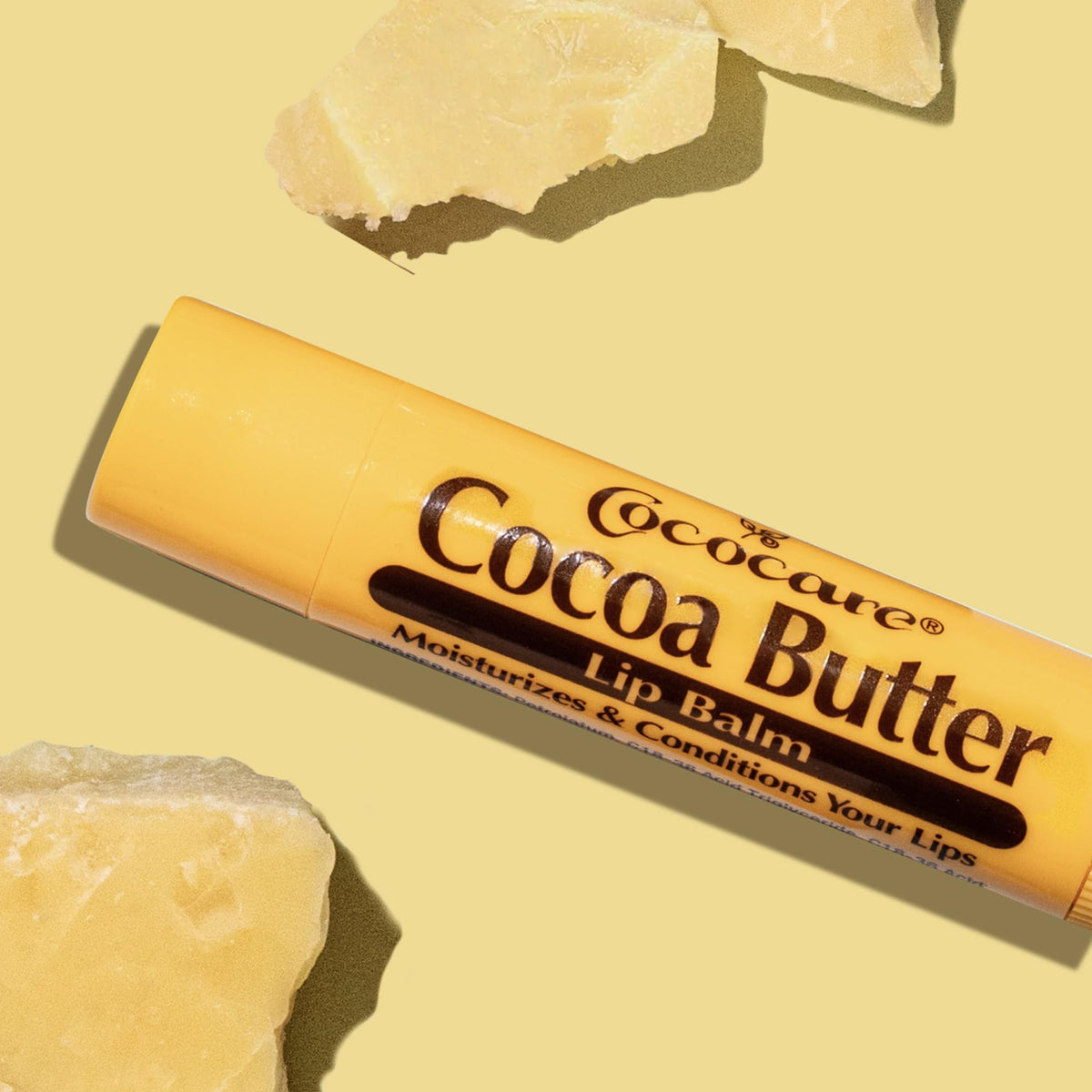COCOCARE open tube showing smooth cocoa butter texture for deep hydration