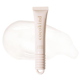 Cocokind clear lip blur balm front packaging showing glossy finish and compact size