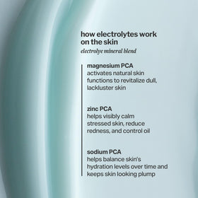 Cocokind pump dispensing cream onto fingertip for precise, mess-free application