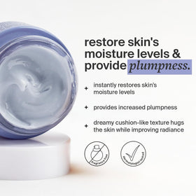 Cocokind cream texture on fingertip displaying rich hydration benefit