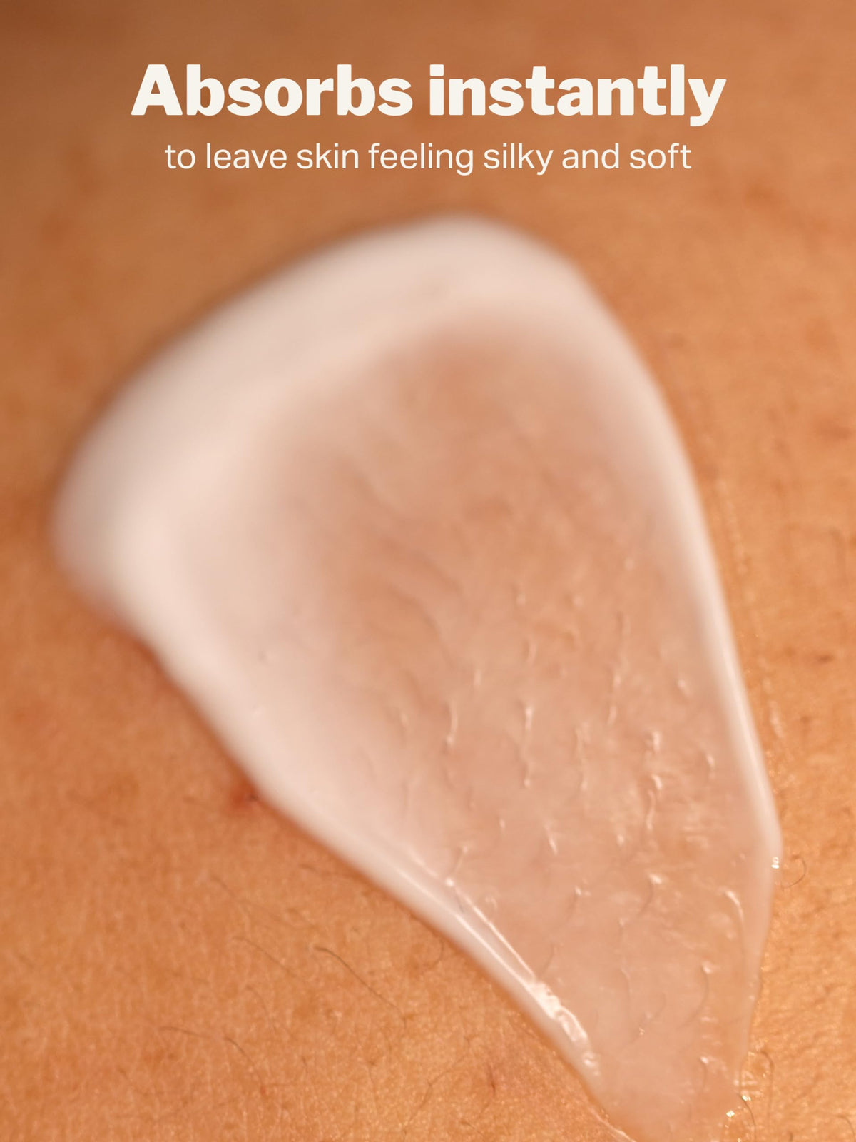 Applying Cocokind retinol body cream on arm for smoother-looking skin