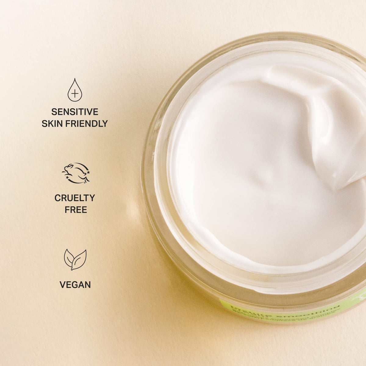 Cocokind cream next to a compact for scale, showing easy everyday size portability