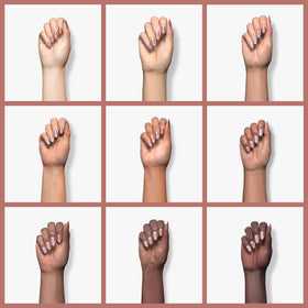 Applying a Color Street strip to a fingernail for quick salon-quality benefit