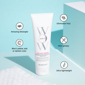 COLOR WOW conditioner cream on hair strand showing smooth detangling benefit