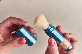 Colorescience brush-on shield bronze brush close-up displaying smooth application