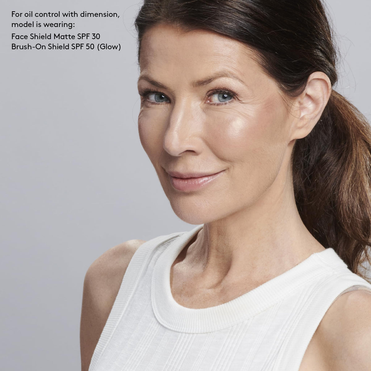 Colorescience Face Shield applied on model for invisible, natural finish