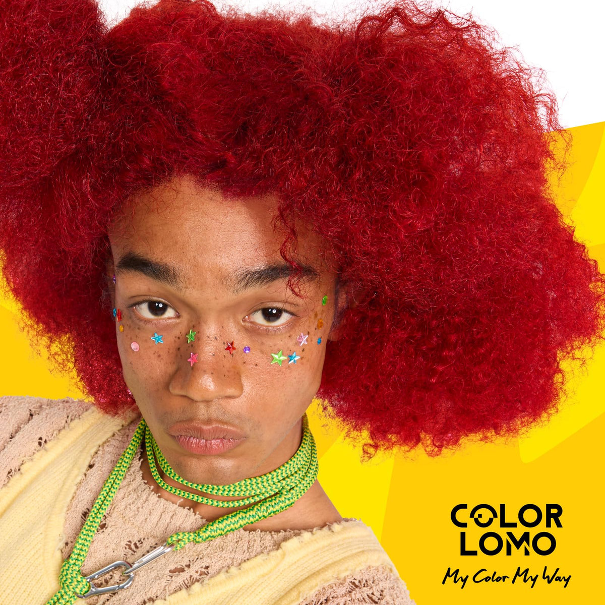 COLORLOMO lifestyle shot of model with vibrant red hair and healthy shine