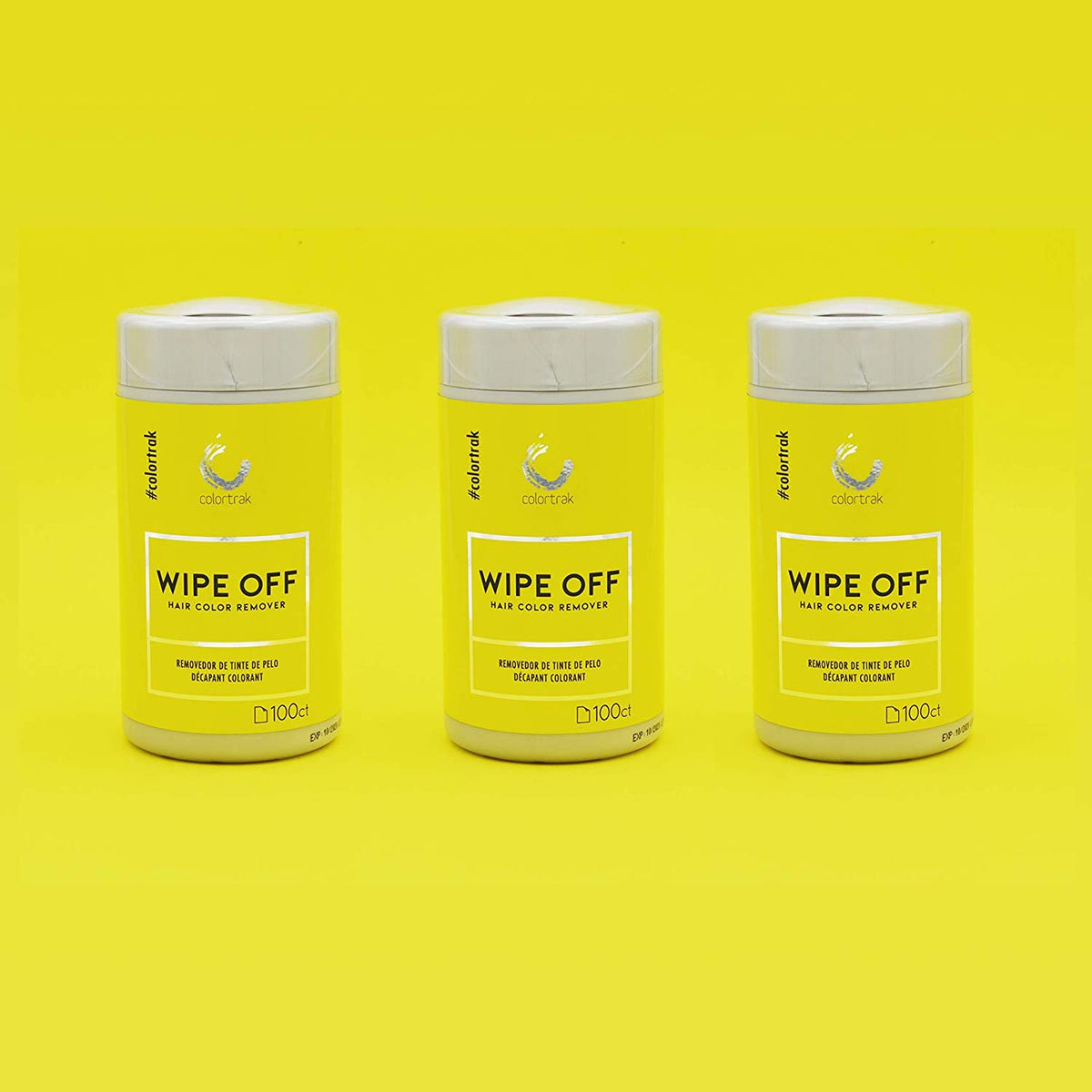 Colortrak wipe beside hair color bottle showing on-the-spot cleanup use