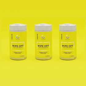 Colortrak wipe beside hair color bottle showing on-the-spot cleanup use
