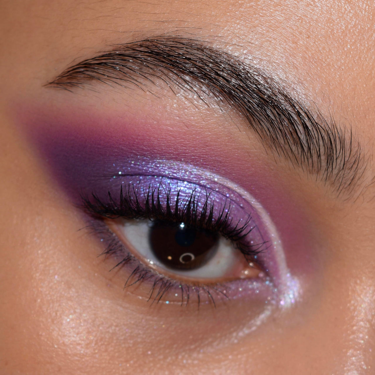 ColourPop metallic swatch showing reflective purple shimmer for vibrant lid highlights