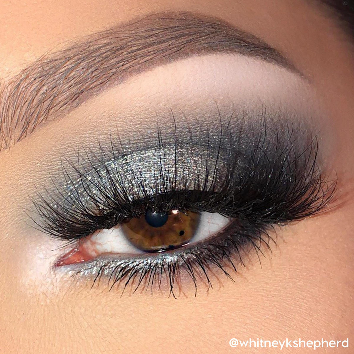 Model applying ColourPop shadow to lid demonstrating easy layering and payoff