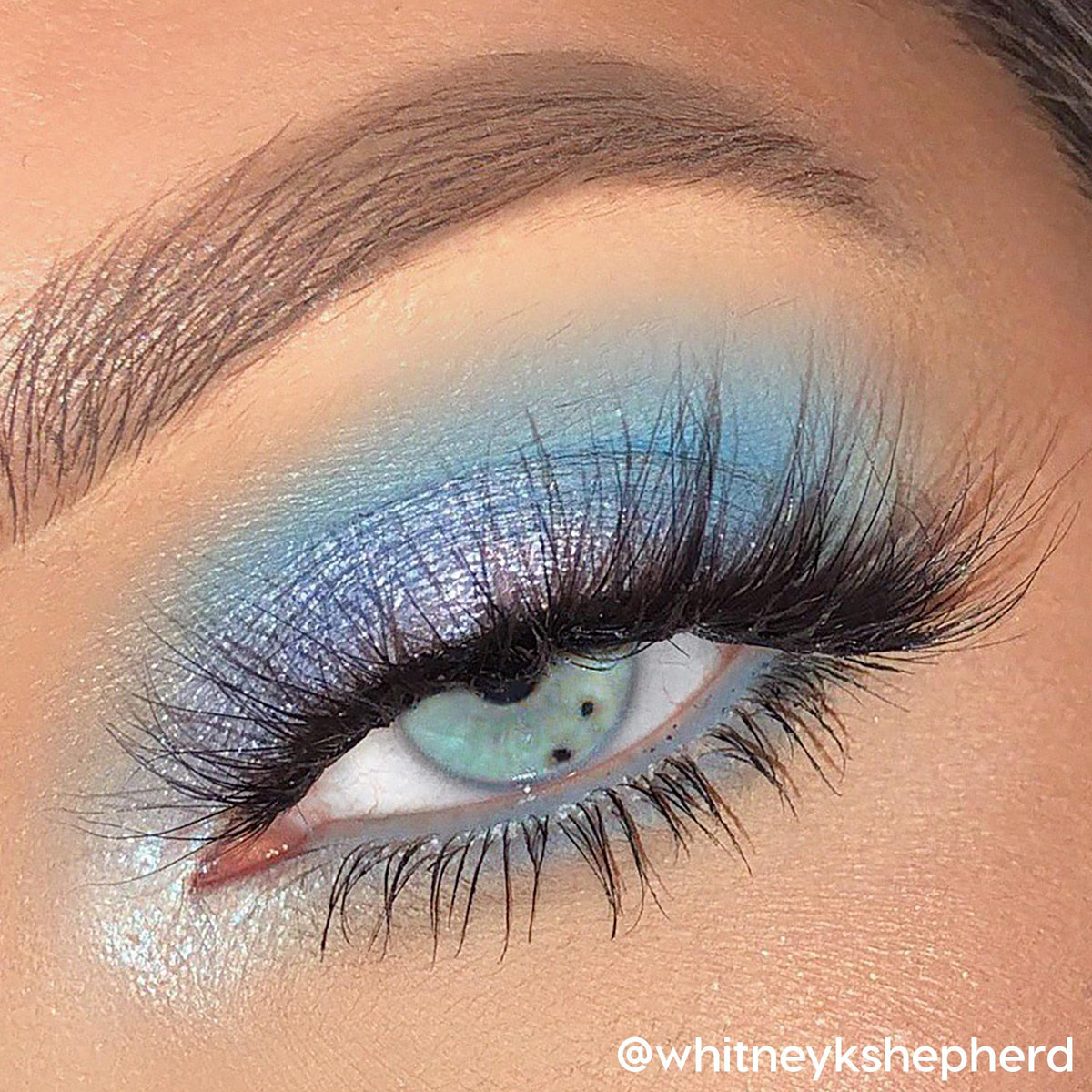 ColourPop palette held in hand illustrating compact size and on-the-go convenience