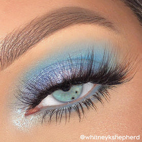 ColourPop palette held in hand illustrating compact size and on-the-go convenience