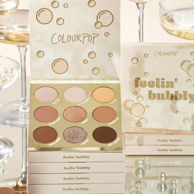ColourPop palette size comparison next to lipstick showing compact travel benefit