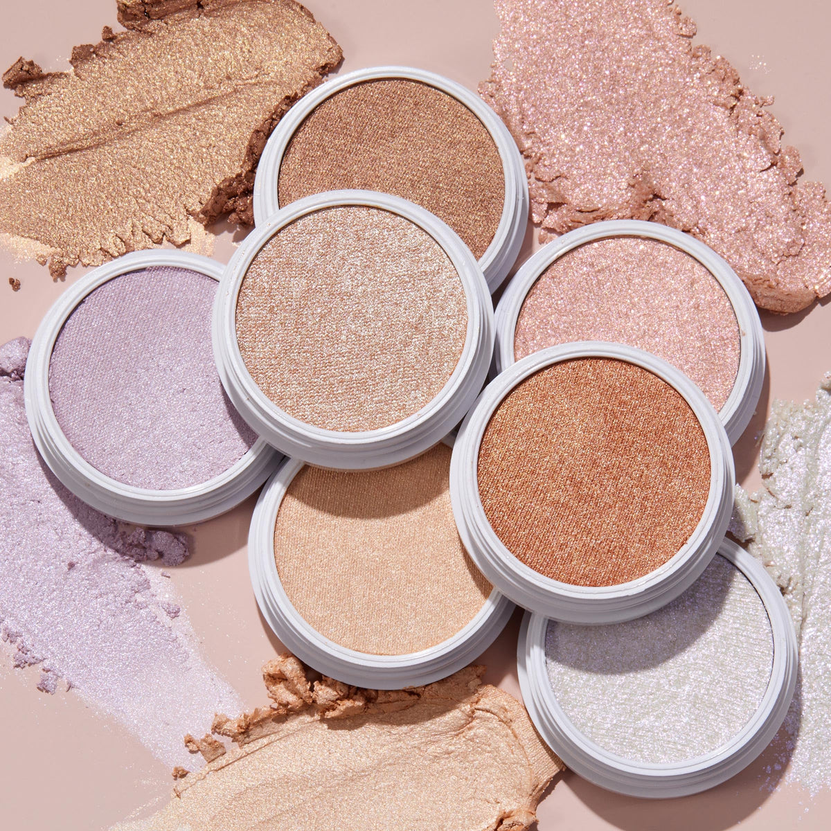 ColourPop highlighter held in hand showing 0.15 oz compact size and travel-ready convenience