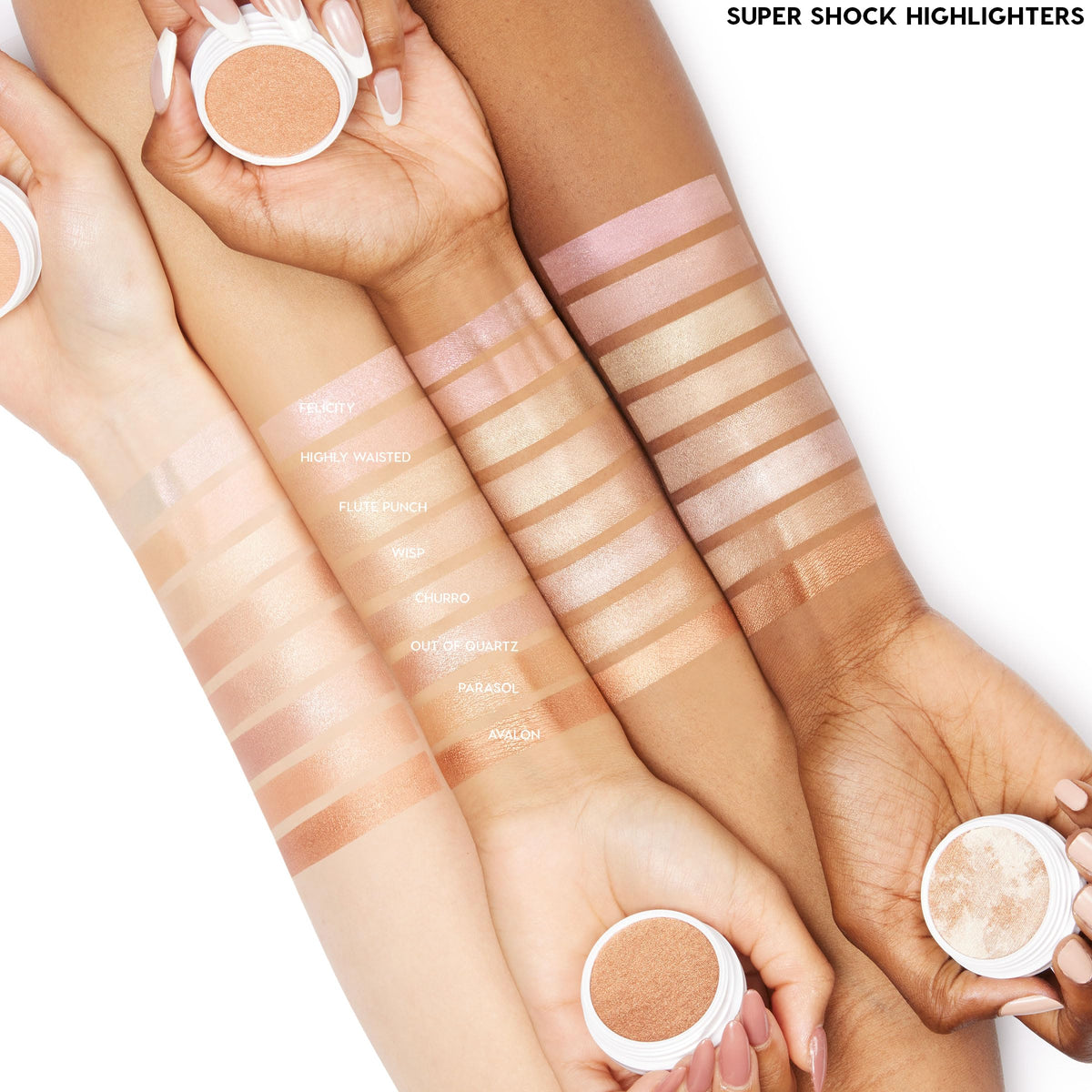 ColourPop highlighter swatches on arm showing buildable color payoff and customizable intensity